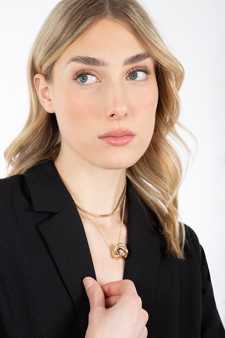 Double gold chain and twisted medallion
