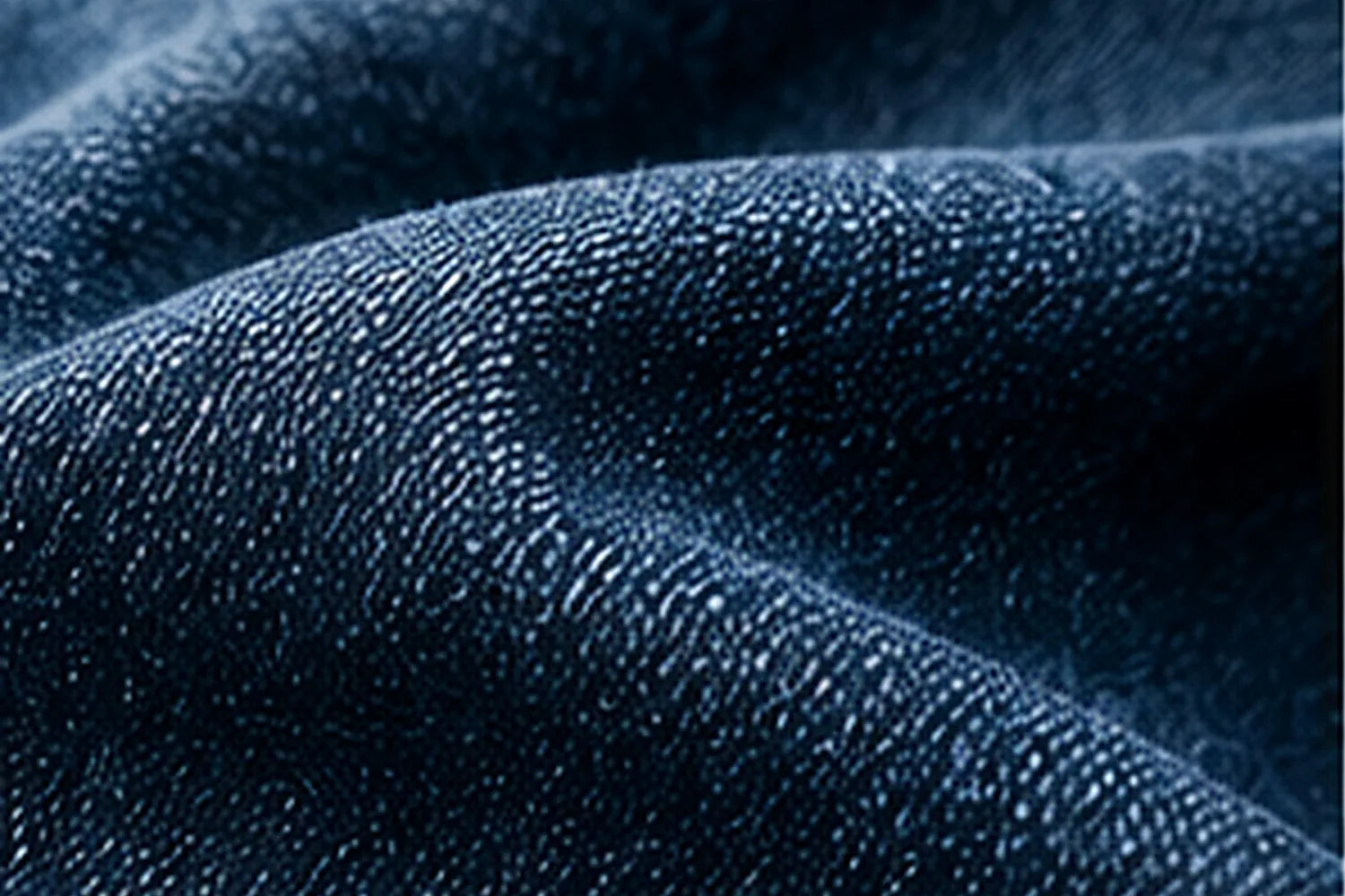 Gros plan sur la texture d'un tissu denim bleu
