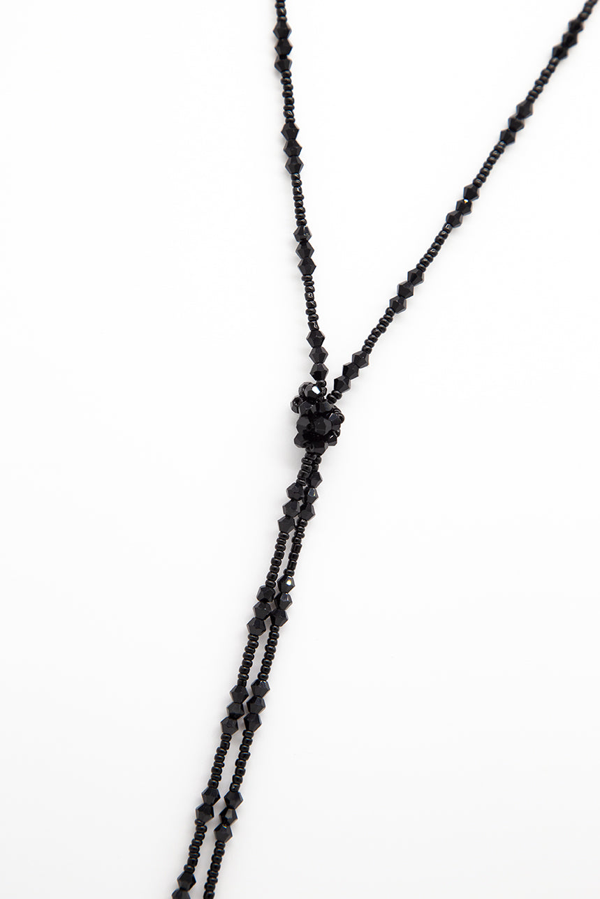 The long black necklace with a knot