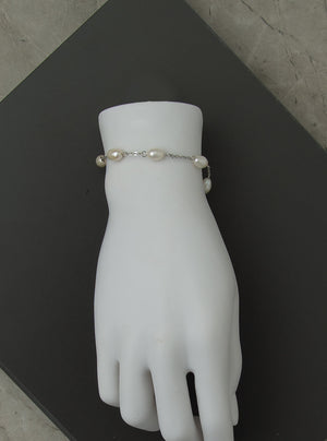 Bracelet avec perles, blanc ou noir